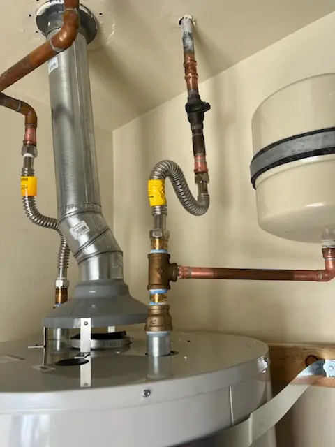 Water heater installation and plumbing repair in Benton